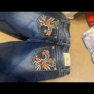 Lightly used dark wash floral jeweled miss me size 30 boot cut jeans
